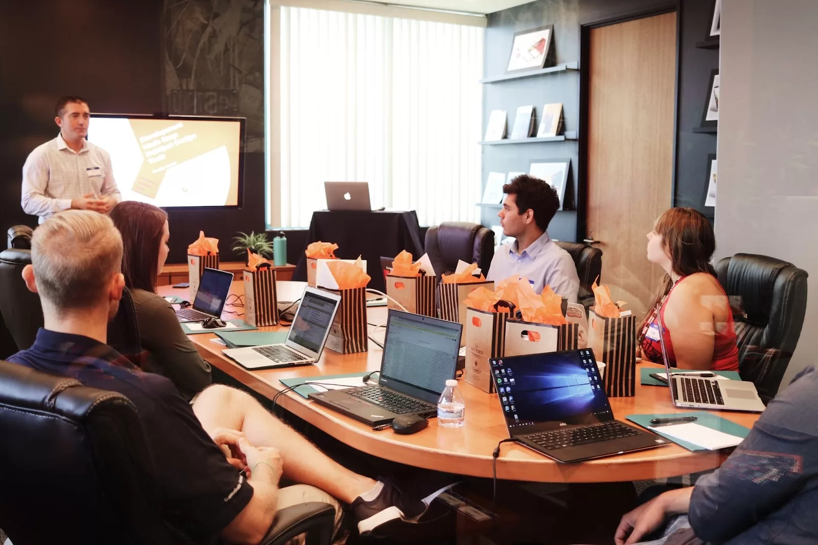 a group of people at an office meeting